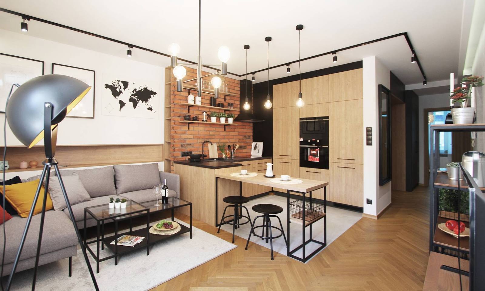 Projekt wnętrza w stylu loft — salon z kuchnią, realizacja Vision Project